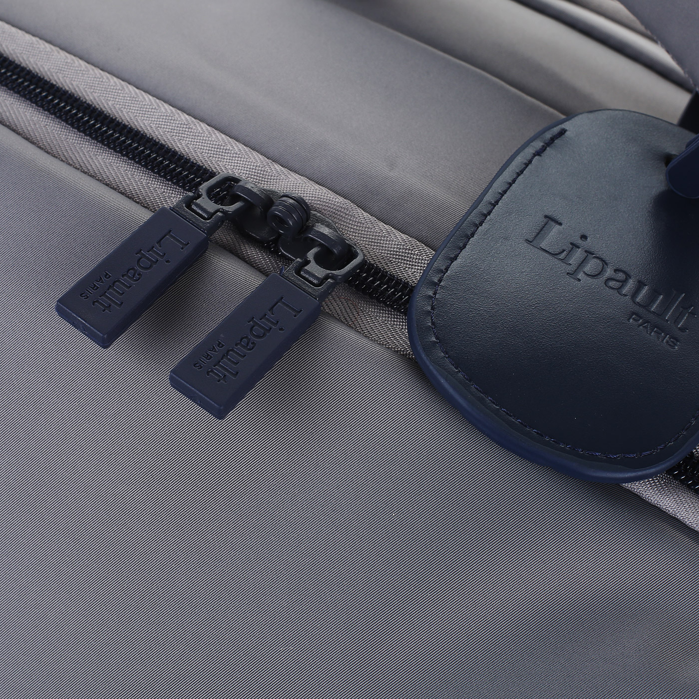 Чемодан маленький S тканевый с кодовым замком Lipault Plume